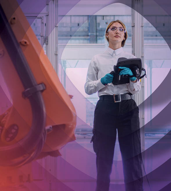 Woman standing by technology with controller in hand 